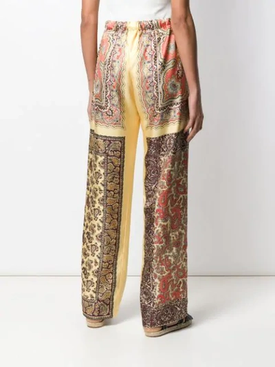 Shop Etro Paisley Printed Palazzo Trousers In Yellow