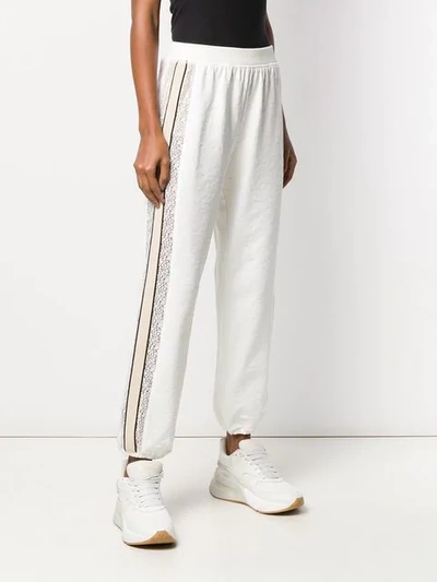 Shop Pinko Embroidered Track Style Trousers In White