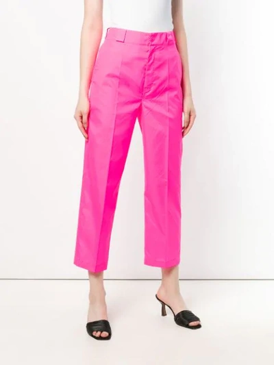 Shop Prada High-rise Trousers - Pink