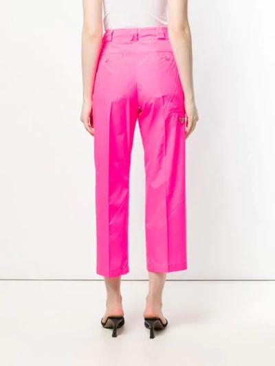 Shop Prada High-rise Trousers - Pink