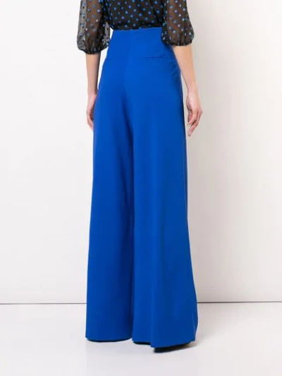 Shop Alice And Olivia Pleated Palazzo Pants In Blue