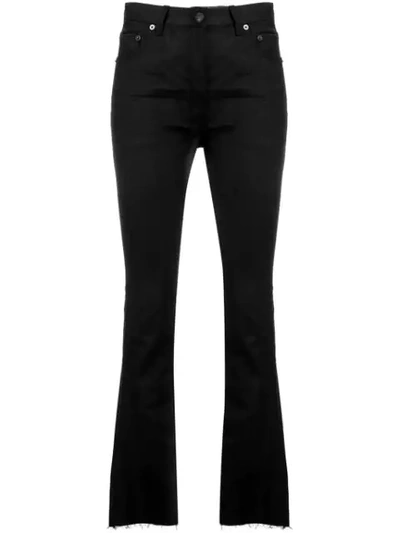 Shop Saint Laurent Frayed Flared Jeans In Black