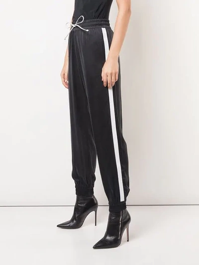 Shop Amiri Side Stripe Track Pants In Black