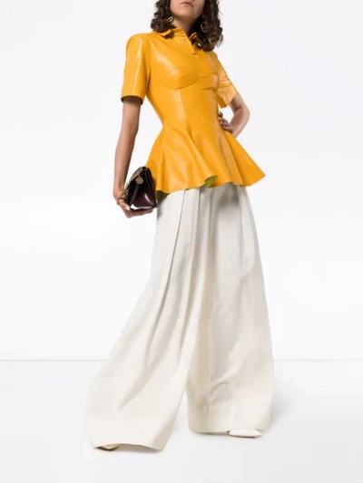 Shop Aleksandre Akhalkatsishvili Peplum Leather Top In Yellow