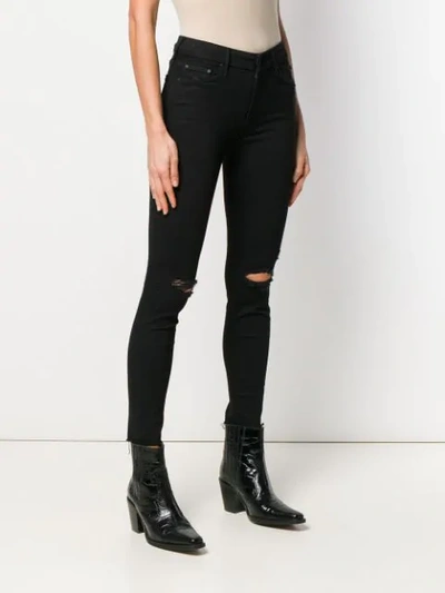 Shop Mother Ripped Skinny Jeans In Black