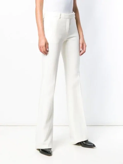 Shop Alexander Mcqueen Classic Flared Trousers In White