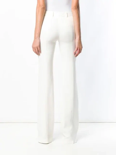 Shop Alexander Mcqueen Classic Flared Trousers In White