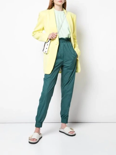Shop Tibi Jogger Tapered Trousers In Green