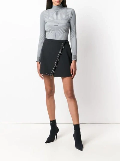 Shop Versus Safety Pin Embellished Mini Skirt In B1008 Black