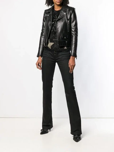 Shop Saint Laurent Mid-rise Flared Jeans In Black