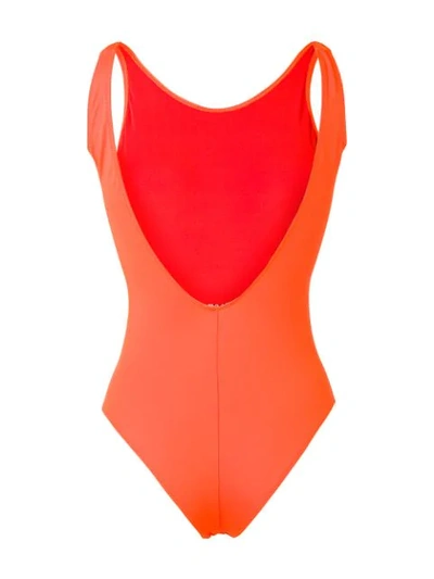 Shop Msgm Logo Open Back Swimsuit In Orange