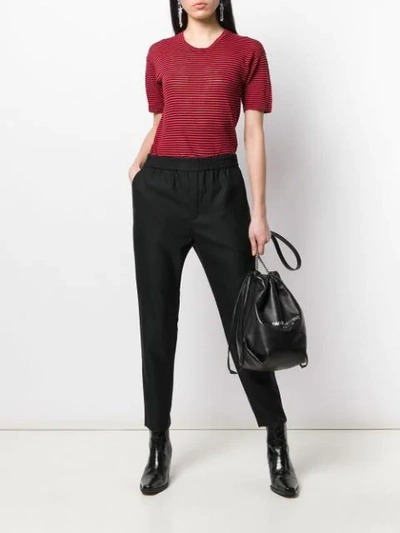 Shop Saint Laurent Stretch Waist Slim-fit Trousers In Black