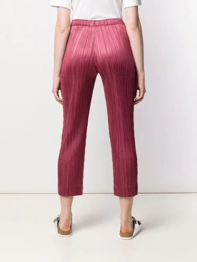 Shop Issey Miyake Micro Pleated Trousers In Red