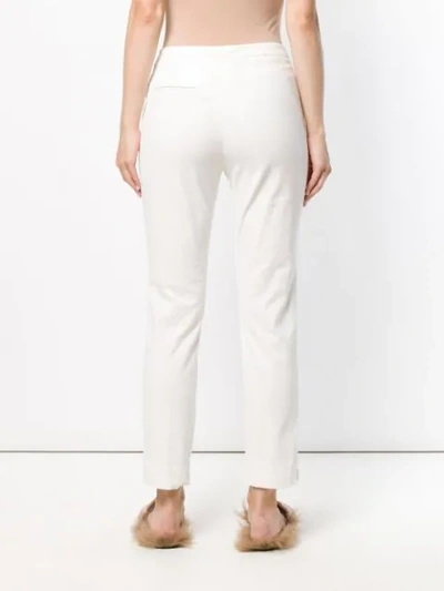 Shop Eleventy Slim-fit Trousers In White