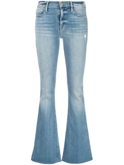 Shop Frame Bootcut Jeans In Blue