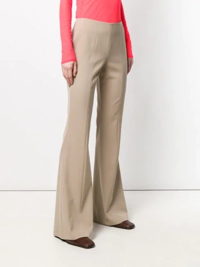 Shop Maison Margiela Flared Style Trousers In Neutrals