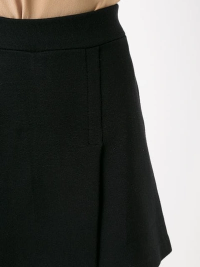 Shop Magrella Wrap Mini Skirt In Black
