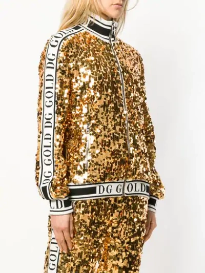 Shop Dolce & Gabbana Branded Sequinned Bomber Jacket In Gold
