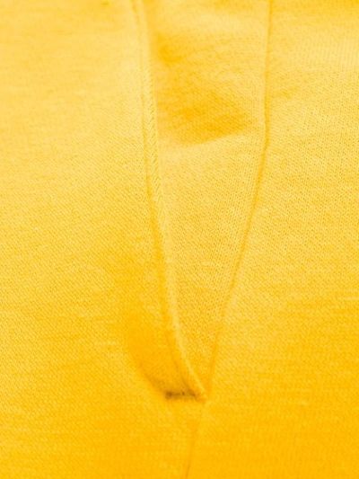 Shop Nike Logo Joggers - Yellow