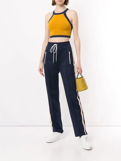 Nagnata Strap Back Crop Sports Top In Turmeric Navy Cream