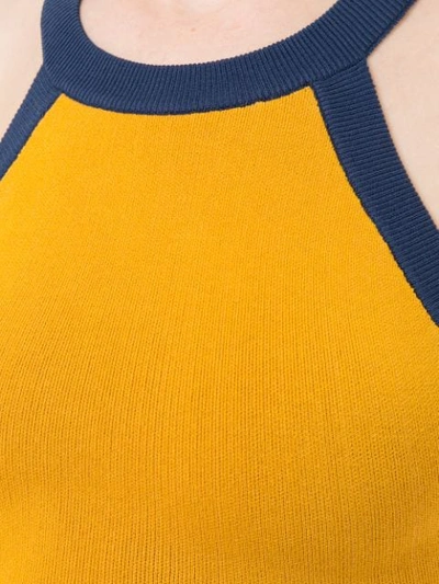 Nagnata Strap Back Crop Sports Top In Turmeric Navy Cream