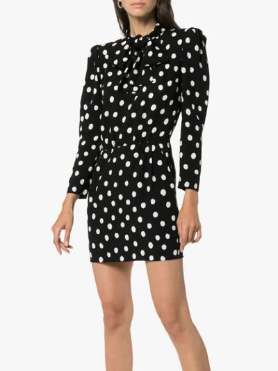 Shop Saint Laurent Pussy-bow Polka-dot Mini Dress In Black