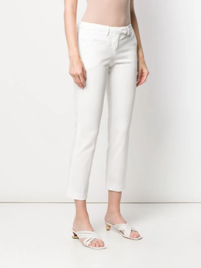 Shop Peuterey Slim Fit Trousers In White