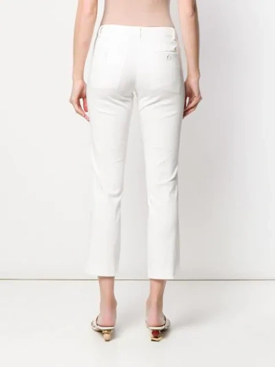 Shop Peuterey Slim Fit Trousers In White