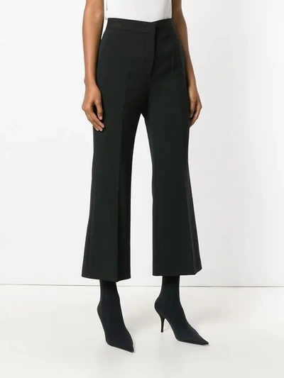 Shop Fendi Cropped Flared Trousers In Black