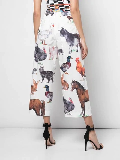 Shop Dolce & Gabbana Animal Print Cropped Trousers - White