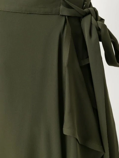 Shop Jw Anderson Wrap Style Asymmetric Hem Skirt In Green