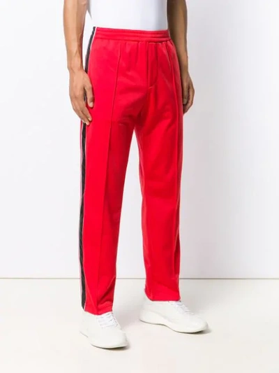 Shop Prada Pleated Straight Leg Trousers In F0011red