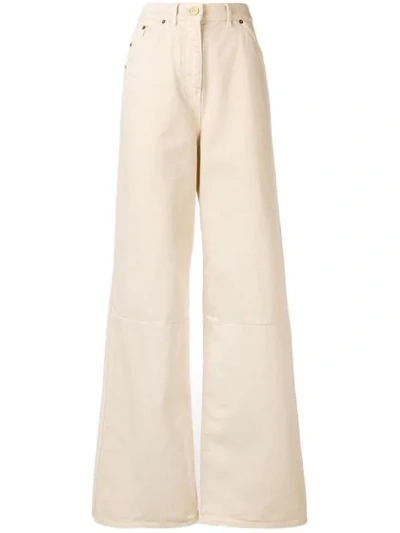 Shop Jacquemus Flared Jeans In Neutrals