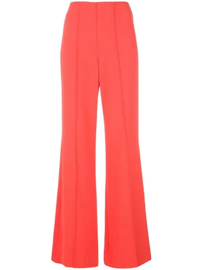 Shop Alice And Olivia Flared Trousers In Red