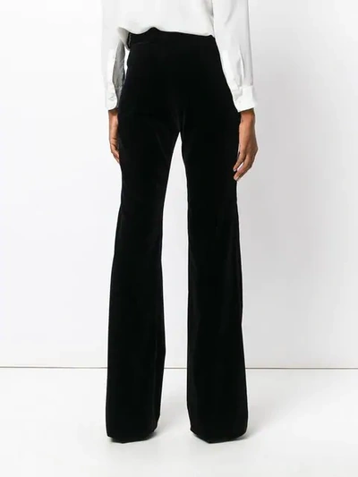 Shop Gucci Flared Trousers In Black