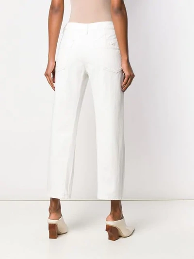 Shop Lemaire Cropped Straight Jeans In White