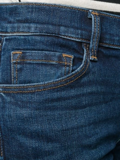 Shop J Brand Cropped Split Cuff Jeans In Blue
