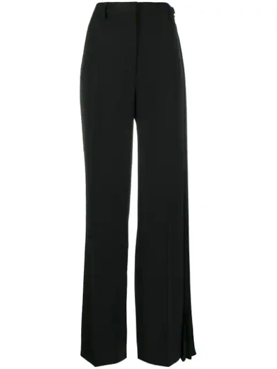 Shop Prada Pleated Detail Trousers In Black