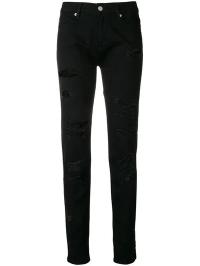 Shop Love Moschino Distressed Skinny Jeans In Black