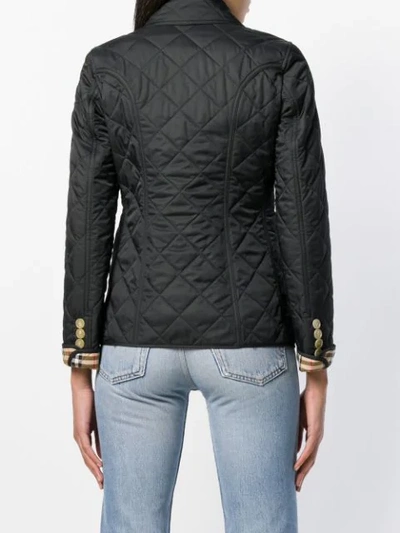 Shop Burberry Check-print Quilted Jacket In Black