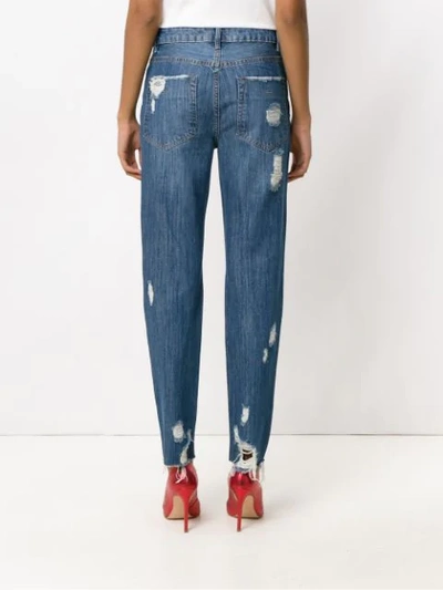 Shop Nk Distressed Jeans In Blue
