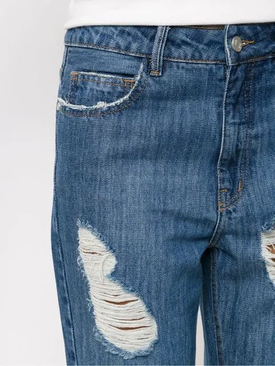 Shop Nk Distressed Jeans In Blue