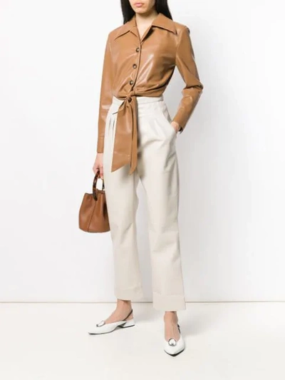 Shop Nanushka Pleated Waist Trousers - Neutrals