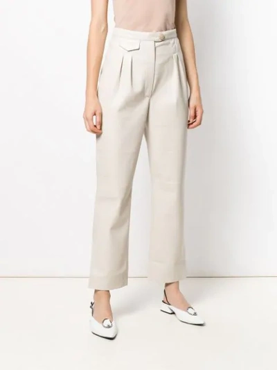 Shop Nanushka Pleated Waist Trousers - Neutrals