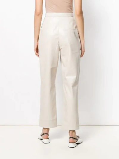 Shop Nanushka Pleated Waist Trousers - Neutrals