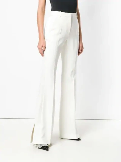 Shop Alexander Mcqueen High Waisted Bootcut Trousers In White
