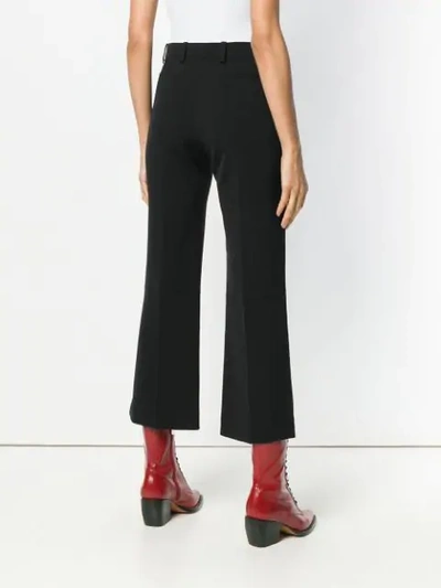 Shop Chloé Cropped Flared Trousers In 001 Black