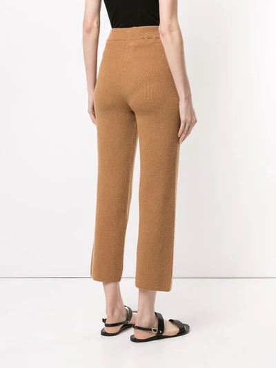 Shop Nanushka Belted Ribbed Knit Trousers - Brown