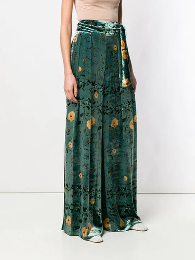 Shop Ailanto Floral Print Trousers In Green