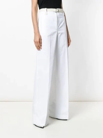 Shop Moncler Belted Wide Leg Trousers In White